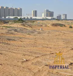 Land for development in the heart of Al Amerah - Ajman, directly behind McDonald's, residential/