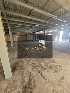 A prime warehouse strategically located on the main street, suitable for various industrial and comm