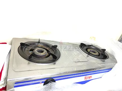 Gas cylinder with regulator and stove