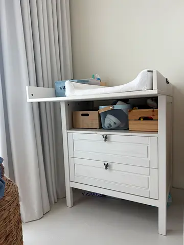 Selling a changing table in excellent condition. Price: 300 AED.