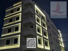 Two-bedroom apartment with a living room and three bathrooms in Al Nuaimiya 2 area, a building for f