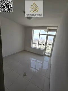 Two bedrooms and a living room with a balcony, two bathrooms, and a built-in wardrobe. Located direc