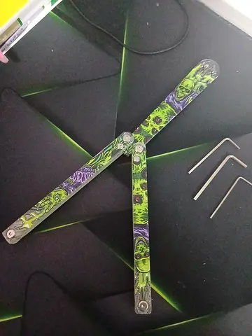 Plastic and wood butterfly knife