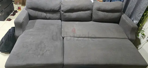 Grey L-Shaped Sofa with Cushions – Clean  Comfortable
