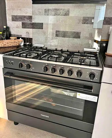 Toshiba brand like new full gas cooker with oven fan new model no scratches no damage