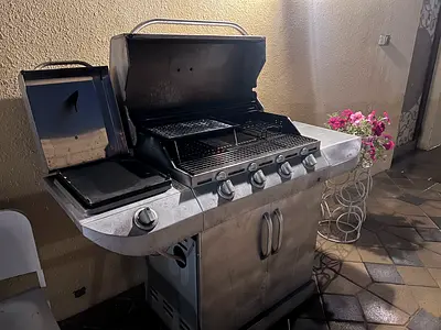 Used charbroil grill, 4 burner + Side Burner