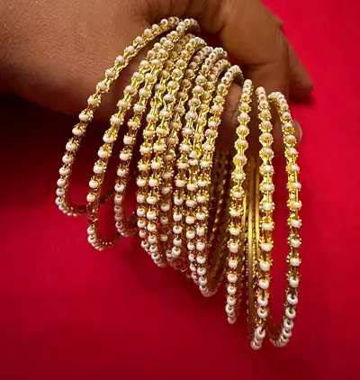 Set of Elegant 12 Gold Bangles suze2.8