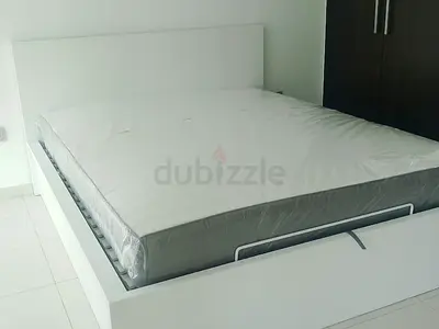 Ikea king size hydraulic bed with Ikea mattress  ‎