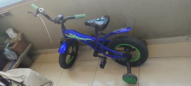 Kids blue cycle with green accents