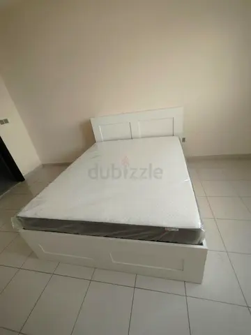 IKEA brimness queen size bed with 4 storage drawers underneath and with IKEA mattress