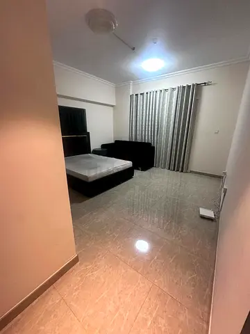 Spacious master bedroom with balcony  attached bath warsan 4
