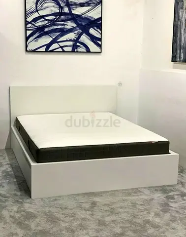 IKEA malam king‑size bed (180 × 200 cm) with 2 storage drawers underneath and an IKEA mattress