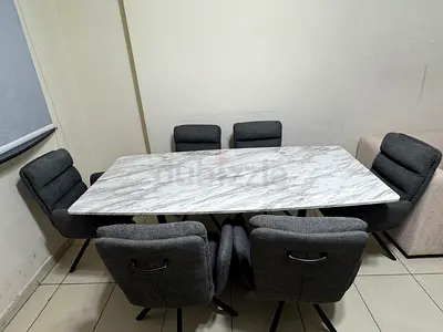 Only Dining Table same as new - chairs not included