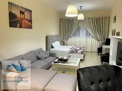 Upscale studio apartment with an open view and a fully furnished semi-detached kitchen. The apartmen