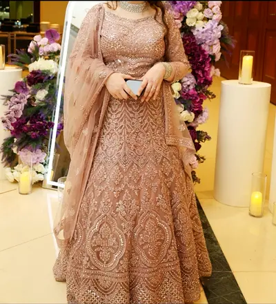 Elegant Beige Bridal Dress with Intricate Embroidery