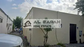 House for sale in Nasiriyah, three sections: Section 1 has 3 rooms, a living room, and a kitchen; Se