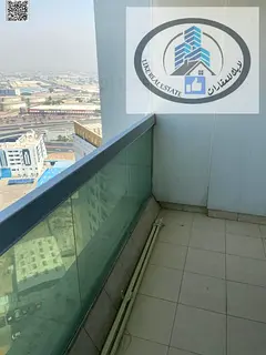 For sale: One-bedroom apartment in Ajman Pearl Towers, in a prime location with an open view of the