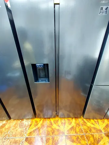 SAMSUNG LATEST MODEL side by side refrigerator with water depanser and ice maker inside tank fill