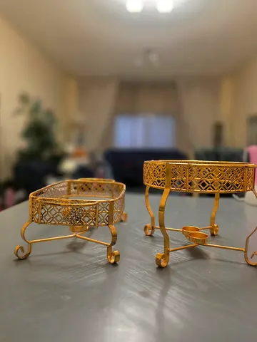 Pair of gold candle holders