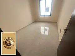 For rent in Ajman, a two-bedroom apartment with a living room, brand new, in Al Jurf 3. Located on S