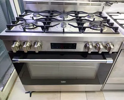 Beko 90x60cm 6burner top gass with oven electric