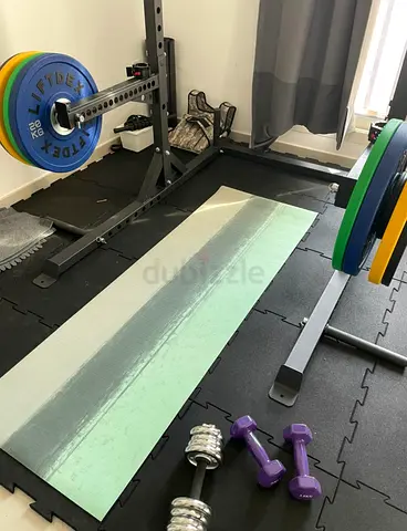Olympic Home Gym (rack , barbell , bench , weights ,plates )