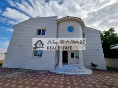 Two-story stone villa in Al Rahmaniyah for sale 1. 25,000 sq ft 2. Large garden 3. 6 master bedrooms