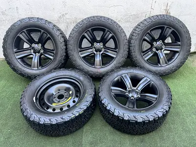 5x original Ram 20” rims + 305/55/20 AT tires