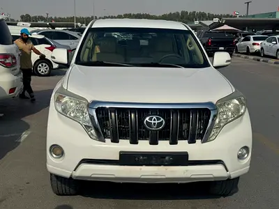 Toyota Prado 2014 white cooor GCc Caleb car