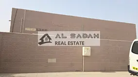 For sale: A corner house in Umm Khanoor, divided into two sections. The first section has 4 bedrooms