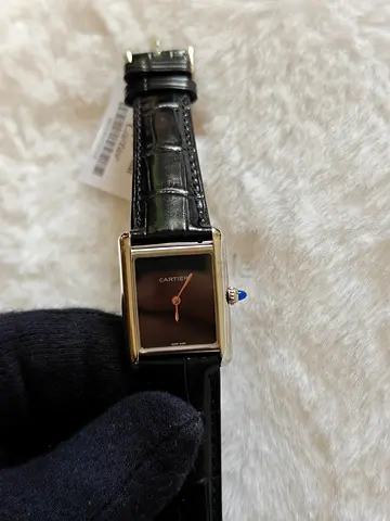 Men watch Cartier