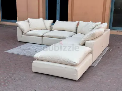 Luscious modular cloud feather filled sofa with footstool