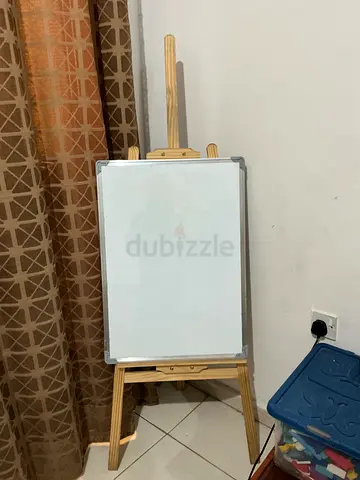 A classic whiteboard with stand and free markers and duster
