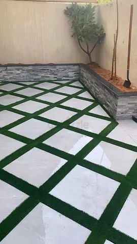 Stylish Outdoor Garden Flooring with Grass and Stone Pattern