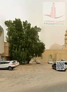 For sale in Ajman, residential investment land in Liwara 2, corner plot on two streets, G+1 area, 20
