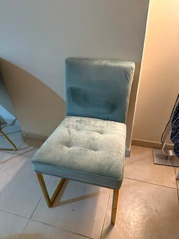 Elegant Upholstered Chair with Gold Legs