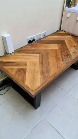 Elegant Wooden Coffee Table with Unique Chevron Design