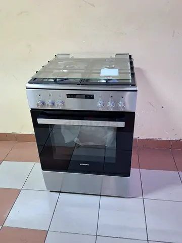 Siemens top gas oven is electric latest model same like new condition