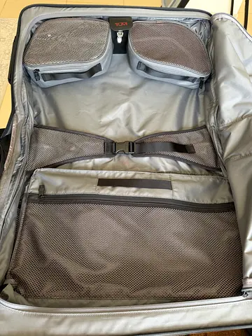 Like New Tumi 4 Wheeled Carry-On