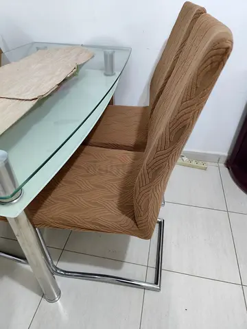 Modern Glass Dining Table with Stylish Chairs