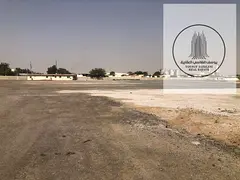 Large storage opportunity fenced land 240000 sqft main road Al Suja