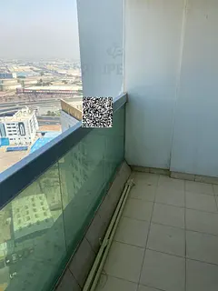 One bedroom and living room apartment for sale in Ajman Pearl Towers with an open view and two bathr