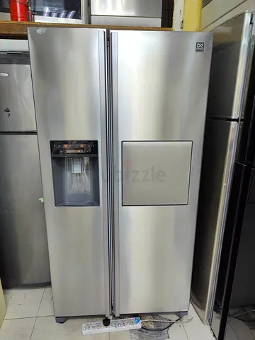 Daewoo Latest model side by side refrigerator with water depanser and ice maker also mini bar refrig
