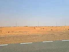 Residential land for sale in Al Manama 13, close to the main road and Al Nasayem Park.