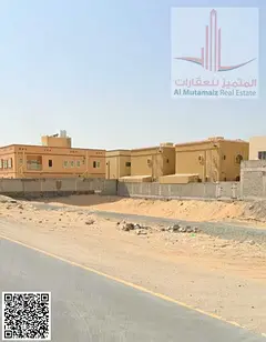 Land for sale in Ajman, Al Muwaihat 1, residential/commercial (G+2), area 9687 sq ft, corner plot.