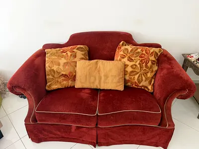 Cozy Red Upholstered Sofa with Decorative Cushions 2 seater