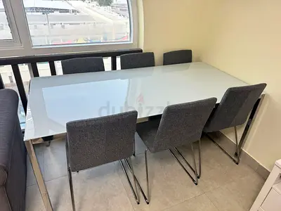 Ikea Elegant Glass Dining Table with Six Chairs