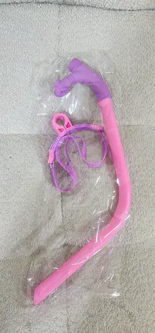 swimming snorkel in pink and purple.