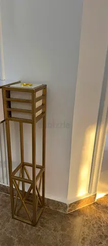 Elegant Gold and White Decorative Stand