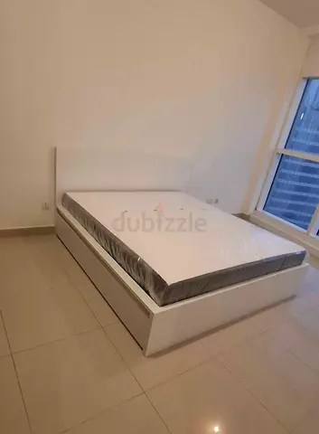 IKEA malam king‑size bed (180 × 200 cm) with 2 storage drawers underneath and an IKEA mattress